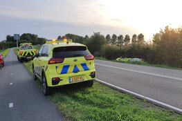 Voertuig Rijkswaterstaat te water in Akersloot