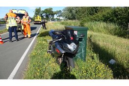 Motorrijder vliegt uit bocht op N203